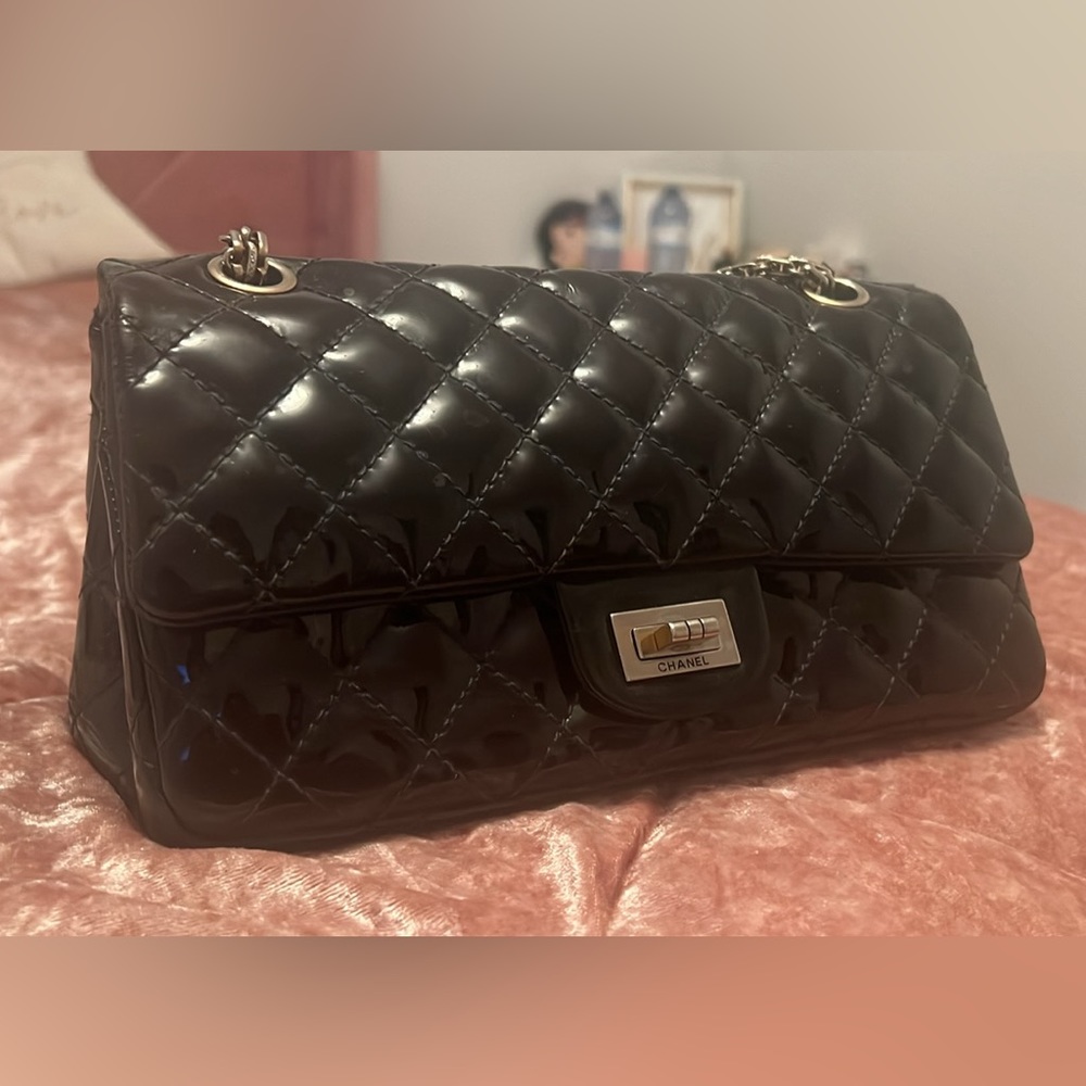 Authentic Chanel patent quilted reissue in black with silver hardware